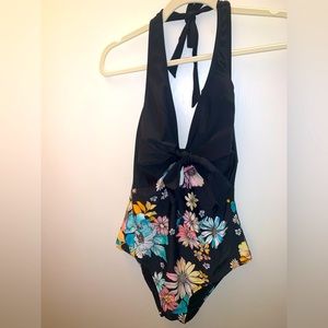 Large one piece ladies floral swim suit.